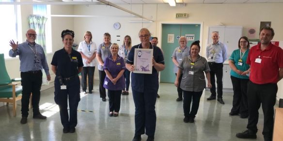 discharge team receiving award