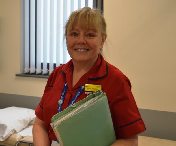 research nurse smiling at camera
