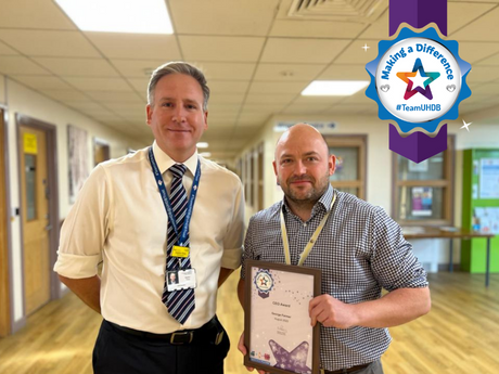 Chief Executive, Stephen Posey (left) presents George Farmer (right) with his first CEO Award.